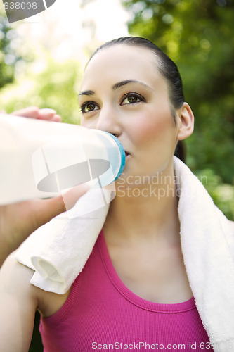 Image of Caucasian woman drinking water
