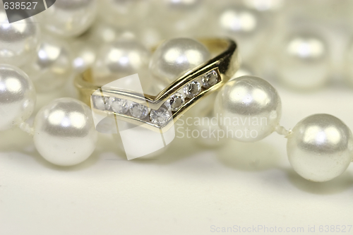 Image of engagement rings and pearls