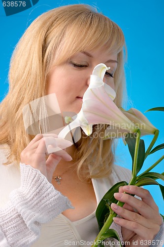 Image of beautiful woman with madonna lily