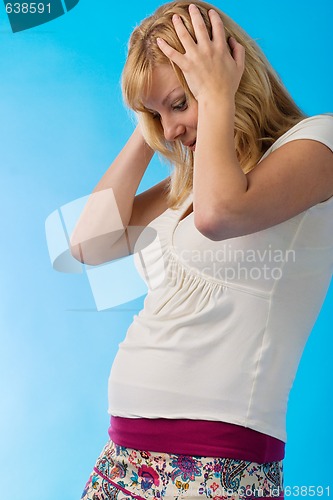 Image of happy surprised pregnant woman