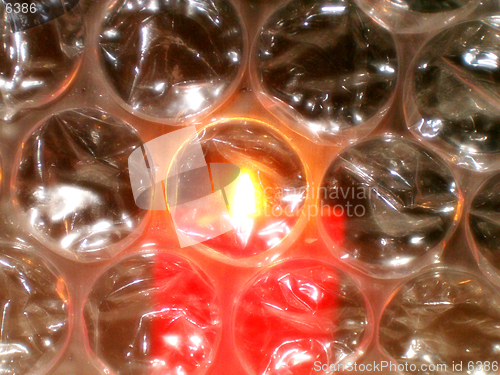 Image of Romantic candle light over bubbles