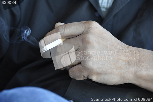 Image of Hand Holding Cigarette