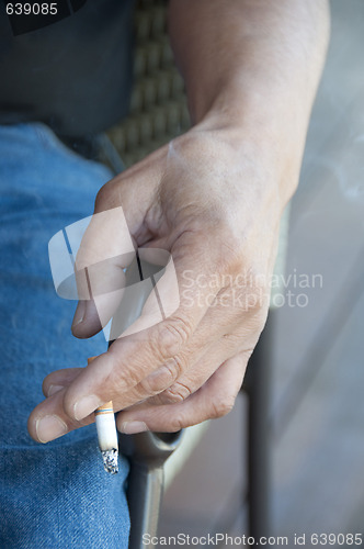 Image of Hand Holding Cigarette