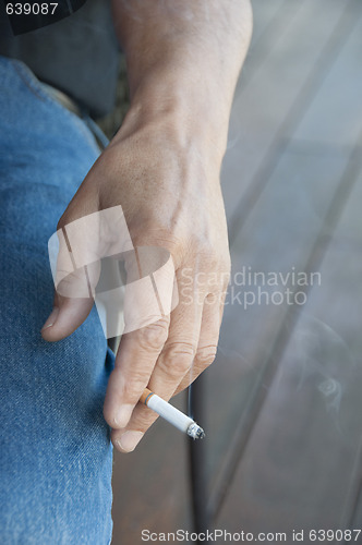 Image of Hand Holding Cigarette