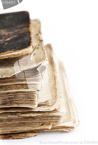 Image of Old book with hard leather cover on white.