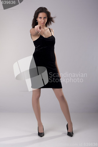 Image of Beautiful Woman in short Black dress