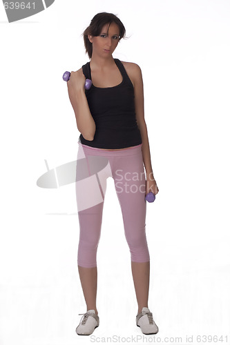 Image of Woman on white holding purple dumbbells