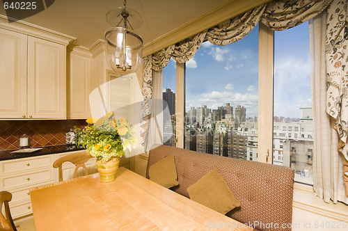 Image of dining table in kitchen nook penthouse new york