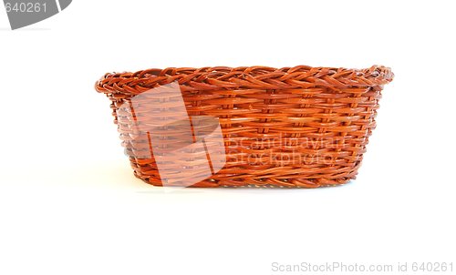 Image of Orange wicker basket without handles side view isolated 