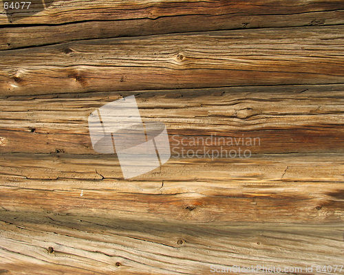 Image of Logs in the wall