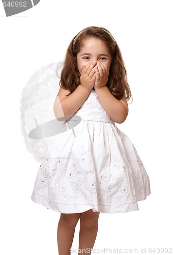 Image of Little angel girl with hands covering her mouth