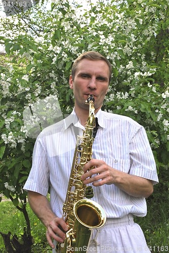 Image of  man with saxophone