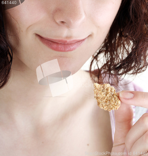 Image of Young people eating milk with cereals