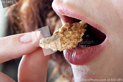 Image of Young people eating milk with cereals