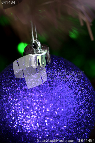 Image of Christmas ornaments on tree.