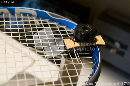Image of restring tennis racket