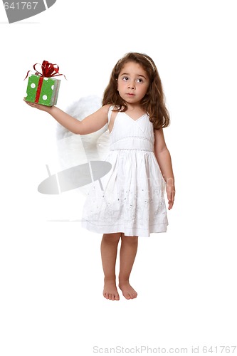 Image of Little angel girl holding a present