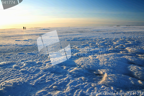 Image of Sunset over frozen lake