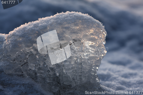 Image of Sunset over frozen lake