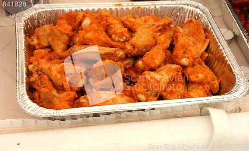 Image of Hot spicy chicken wings in pan