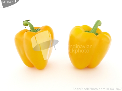 Image of Two yellow peppers