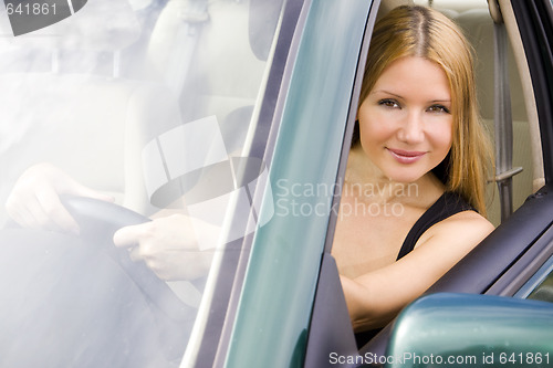 Image of pretty girl in the car