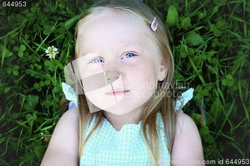 Image of Portrait of thoughtful little girl.