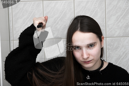 Image of Girl with knife