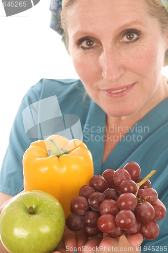 Image of nurse or doctor medical female with healthy vegetables