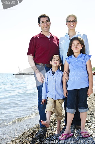 Image of Happy family at beach