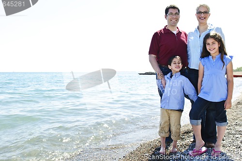 Image of Happy family at beach