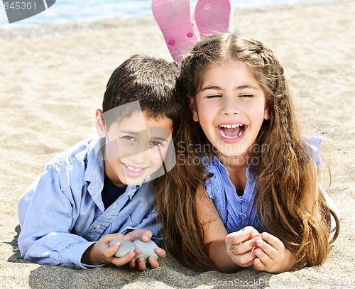 Image of Brother and sister at beach