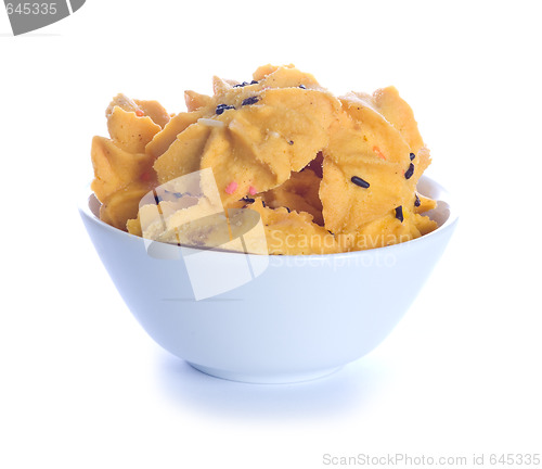 Image of Small, white bowl with cookies