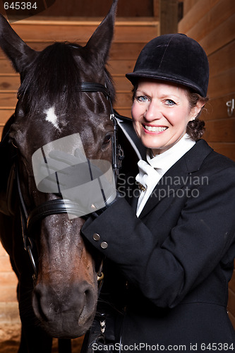 Image of Senior woman with her horse