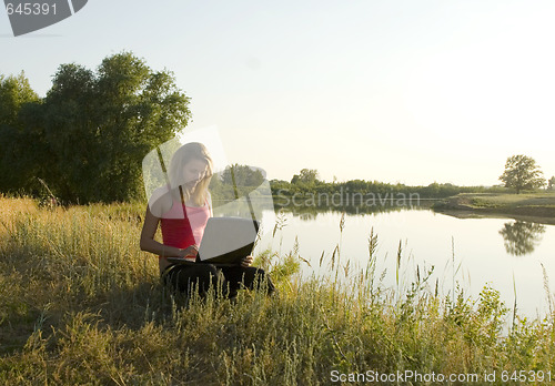 Image of woman with notebook