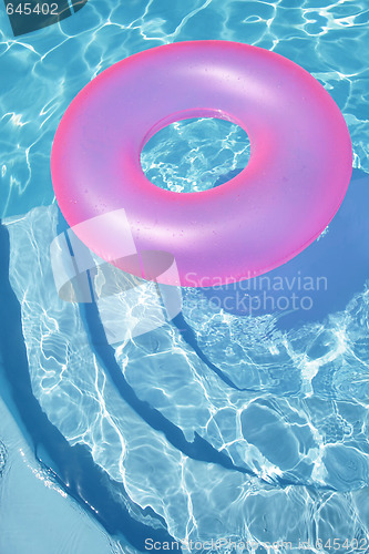 Image of Pink Ring Floating in a Blue Pool