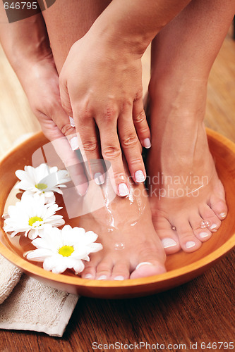 Image of relaxing bath with flowers