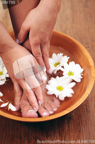 Image of relaxing bath with flowers