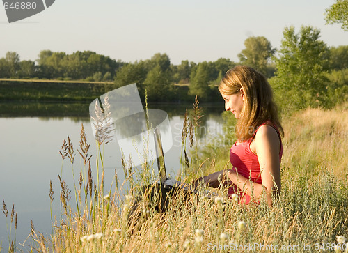 Image of woman with notebook