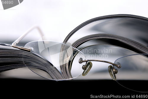 Image of Close up on the Glasses and the Magazine