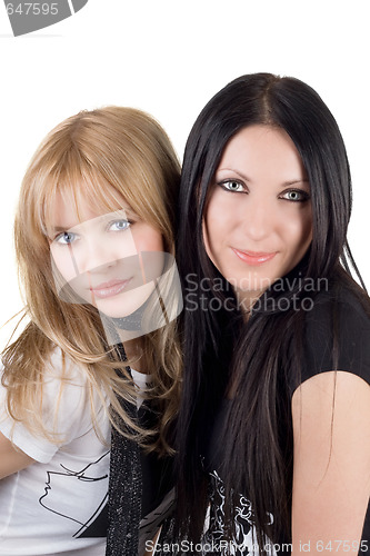 Image of Portrait of the two pretty smiling girlfriends. Isolated