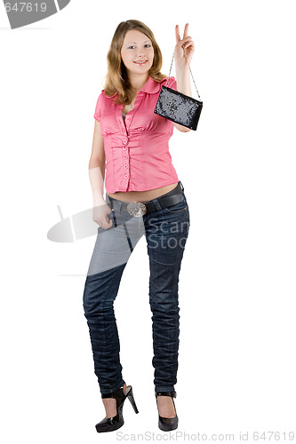 Image of Beautiful smiling girl with a handbag. Isolated on white