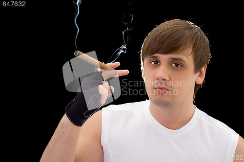 Image of Portrait of the young man with cigar. Isolated