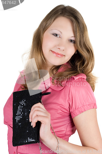 Image of Beautiful young woman with a handbag. Isolated 