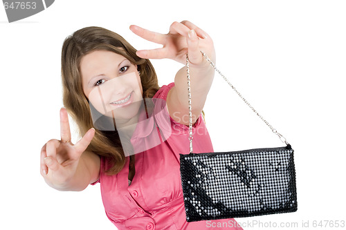 Image of Beautiful smiling young woman with a handbag. Isolated 
