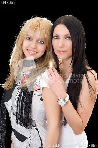 Image of Portrait of the young brunette and blonde. Isolated