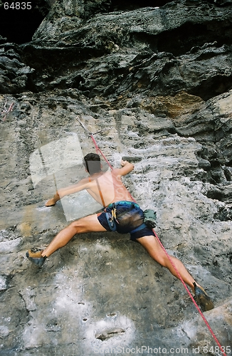 Image of man climbing