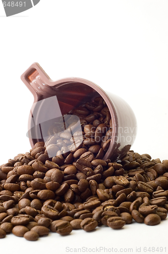 Image of Cup with coffee beans 