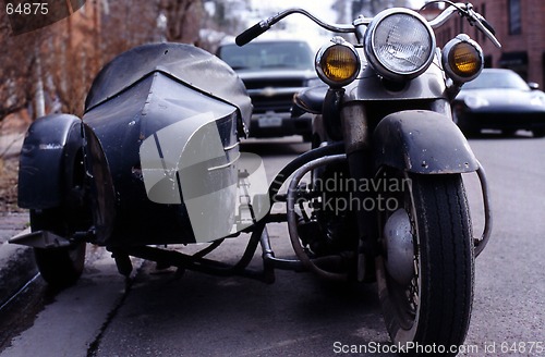 Image of moterbike with side car