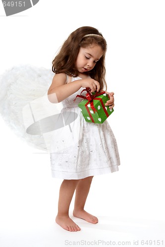 Image of Angel  child with Christmas present